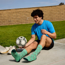 Socks That Support Youth Sports (Green Soccer Balls)