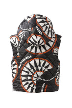 Reversible Puffer Vests by Emily Lovelock