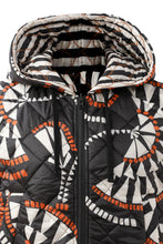 Reversible Puffer Vests by Emily Lovelock
